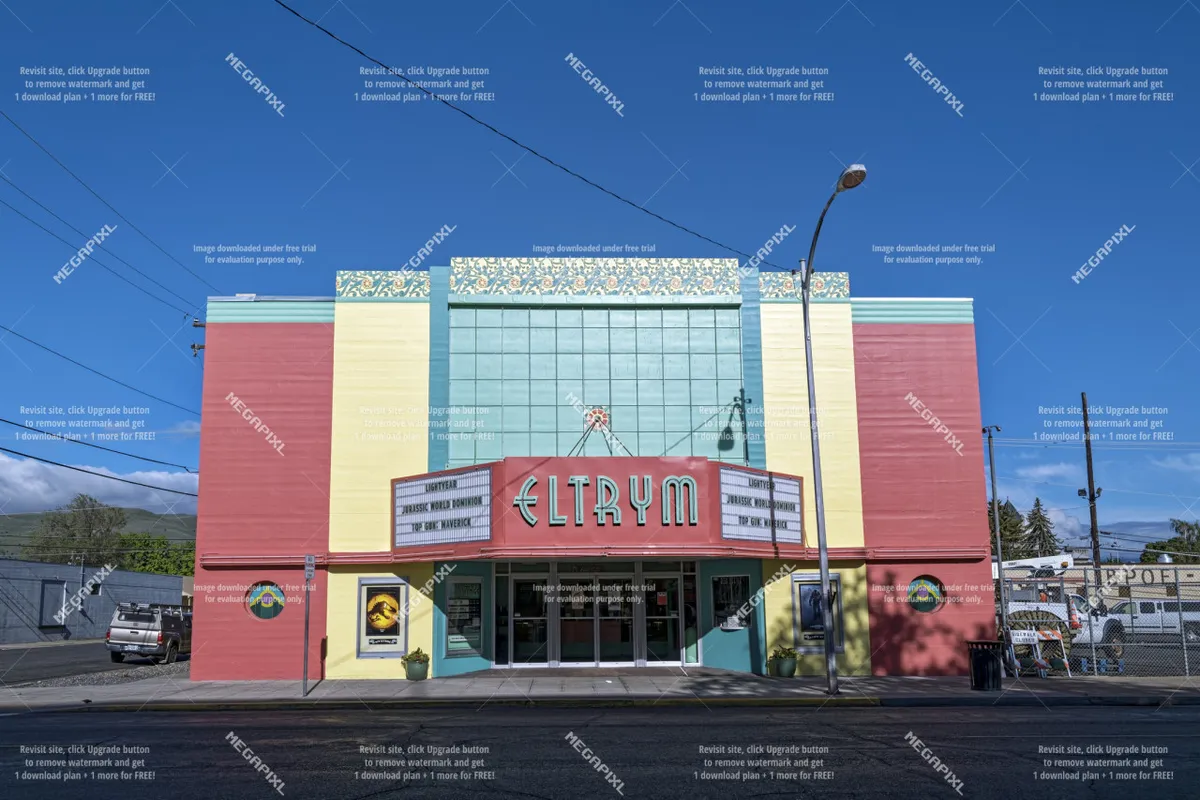 The colorful facade and art deco details of the Eltrym, a local landmark, invite guests to explore Baker City's vibrant downtown scene. The lively exterior suggests opportunities for entertainment and community events.